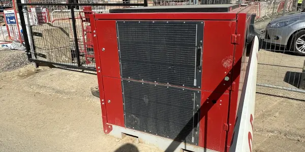 Close up of SOSEC 200 V2 cubed box with solar panels and boom.