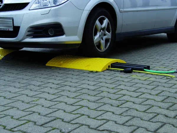 car going over speed bump.